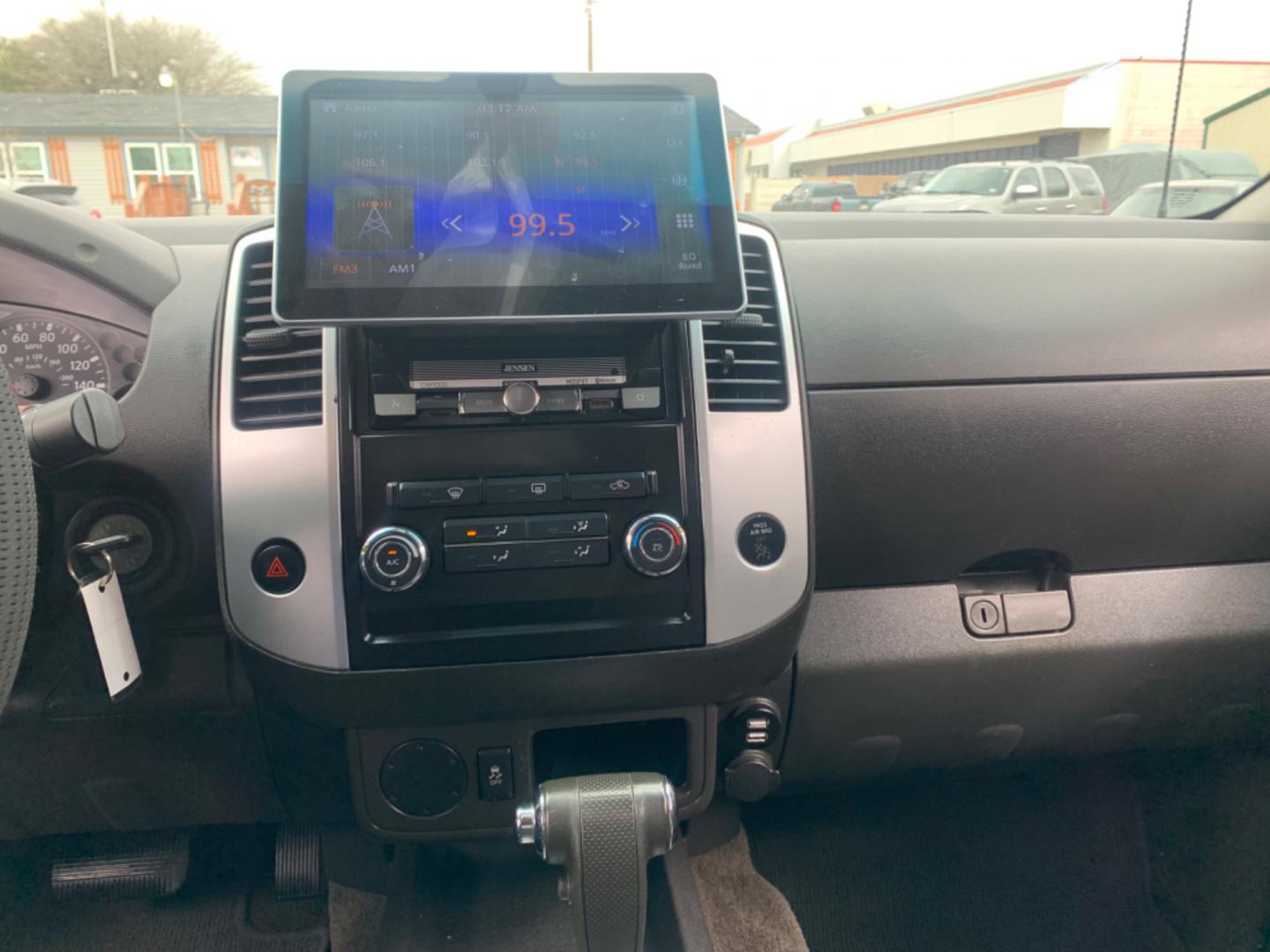 2012 White Suzuki Equator Sport Crew Cab 2WD (5Z61D0ER4CC) with an 4.0L V6 DOHC 24V engine, Automatic transmission, located at 1830 North Belt Line Road, Irving, TX, 75061, (469) 524-0199, 32.834373, -96.993584 - Photo#13